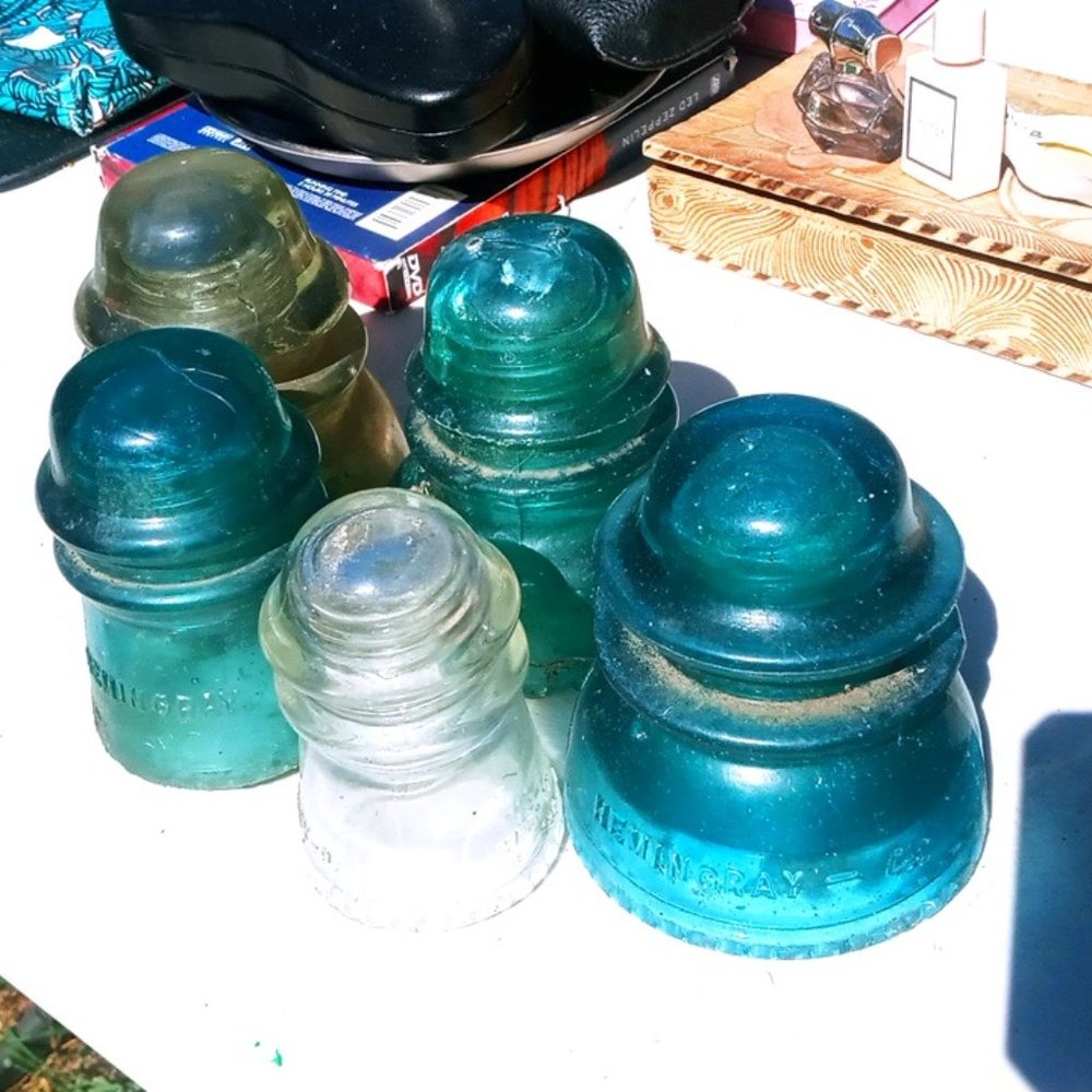 ntage teal and clear glass insulators